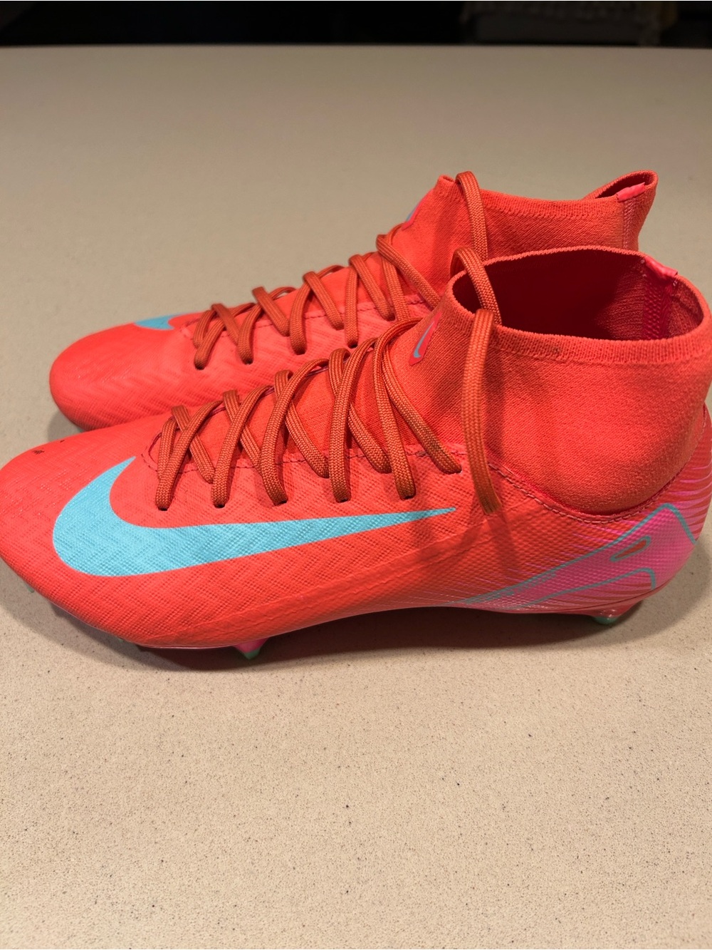 Nike Mercurial High-Cut Soccer Cleats - Bright Orange with Teal Swoosh
